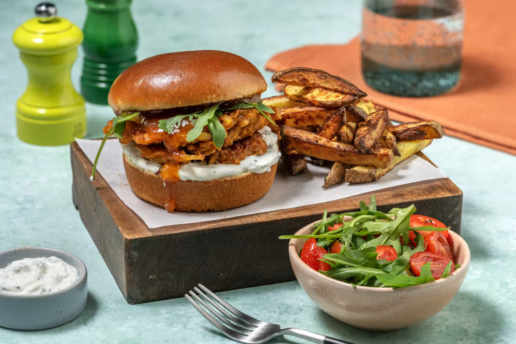 Onion Bhaji Fritter Burger and Chips with Mint Yoghurt, Mango Chutney and Tomato Salad - Bermy Recip